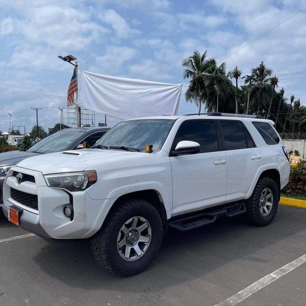 A white Toyota 4Runner from the ITS fleet parked in Monrovia