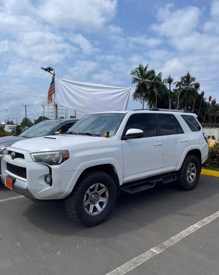 White Toyota 4Runner with off road tyres at the ITS yard